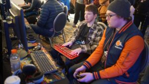 Two people playing seriously